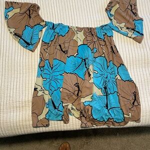 Lola by Simply Sisters off the shoulder, with attached bell sleeves.